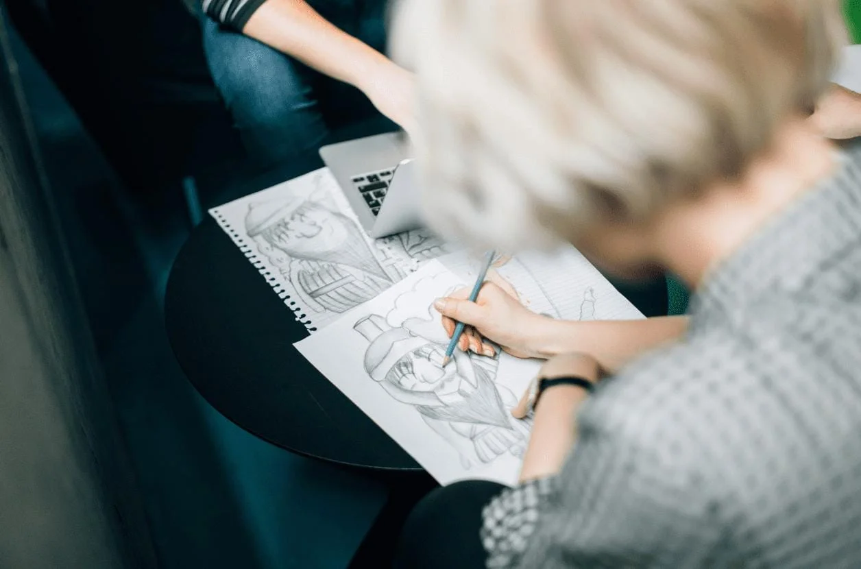 Team sketching ideas and strategies